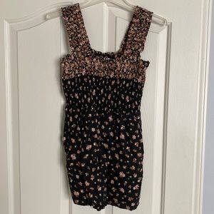 Short romper with pockets.  Top and straps are elastic, close up picture to see.
